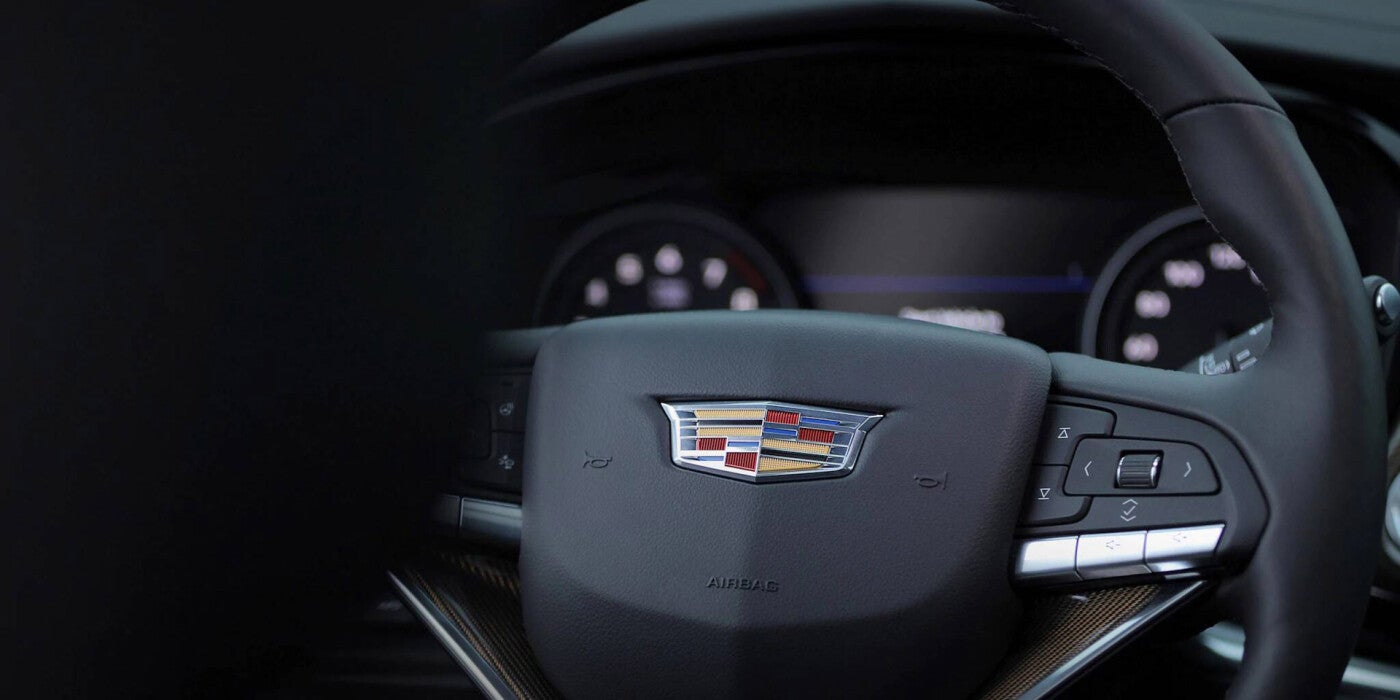 image of a Cadillac steering wheel